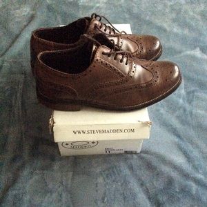 Men’s Steve Madden brown leather wingtip shoes.